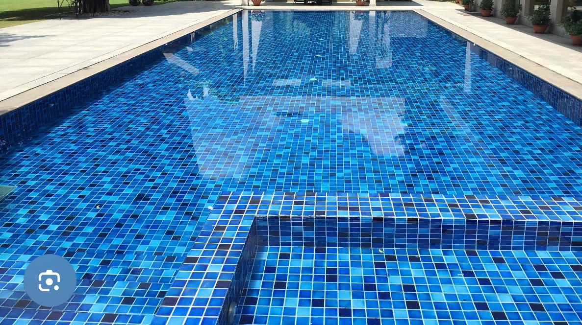 Luxury tiled swimming pool with mosaic finish