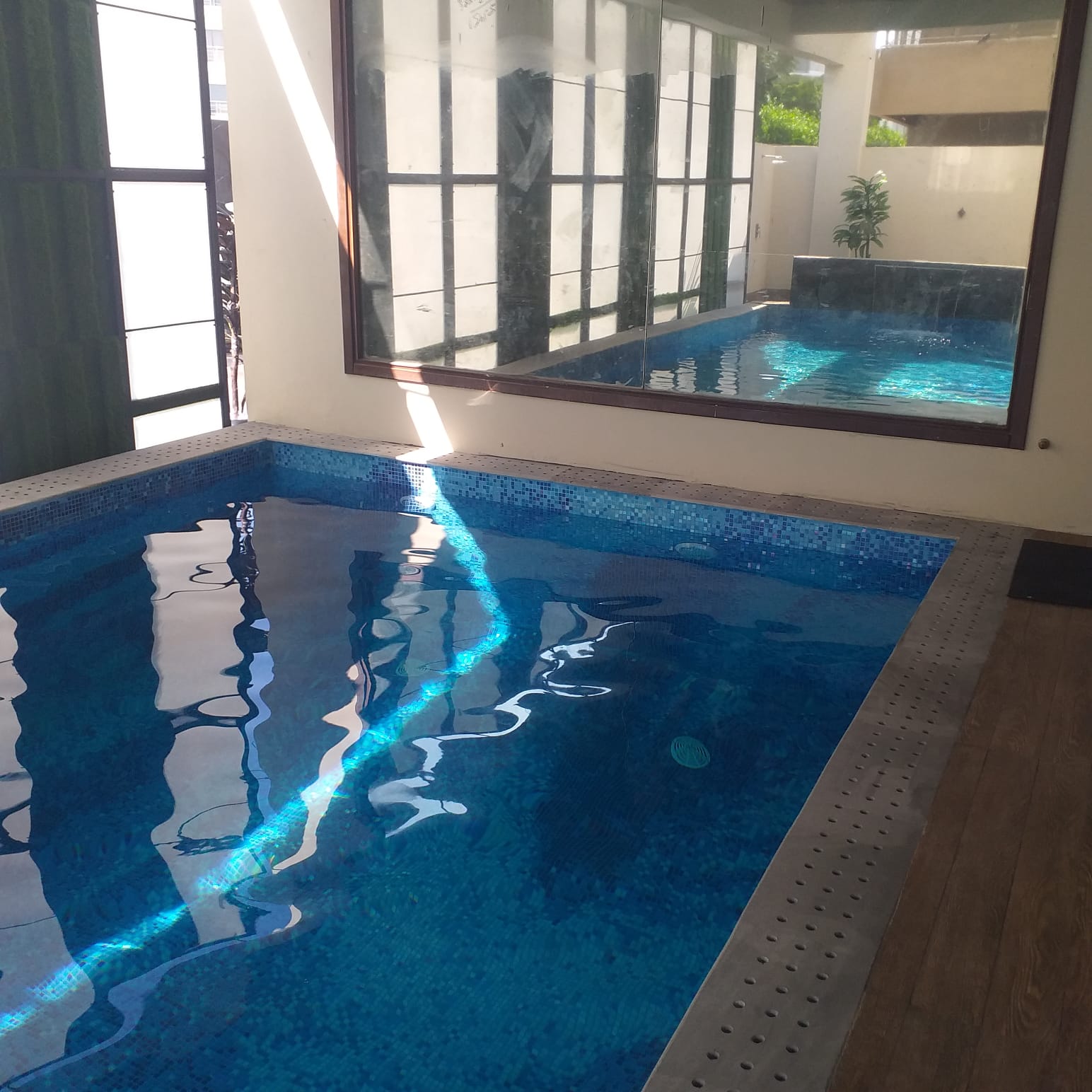 Completed pool with clear blue water