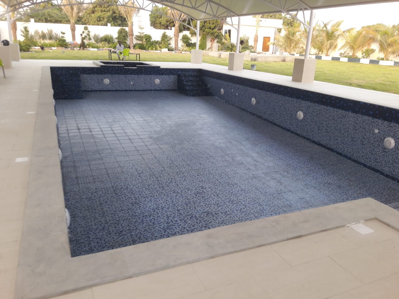 Pool with terrace and furniture